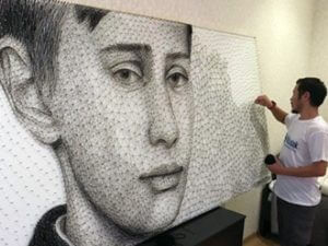 Киргизский художник сделал портрет Путина из гвоздей и шерсти